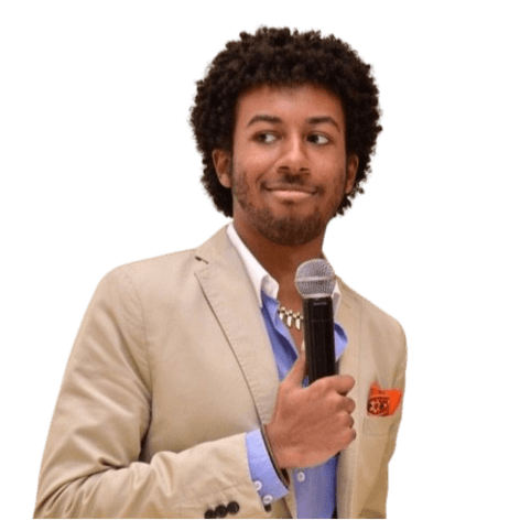 Jared Griffin holding a microphone